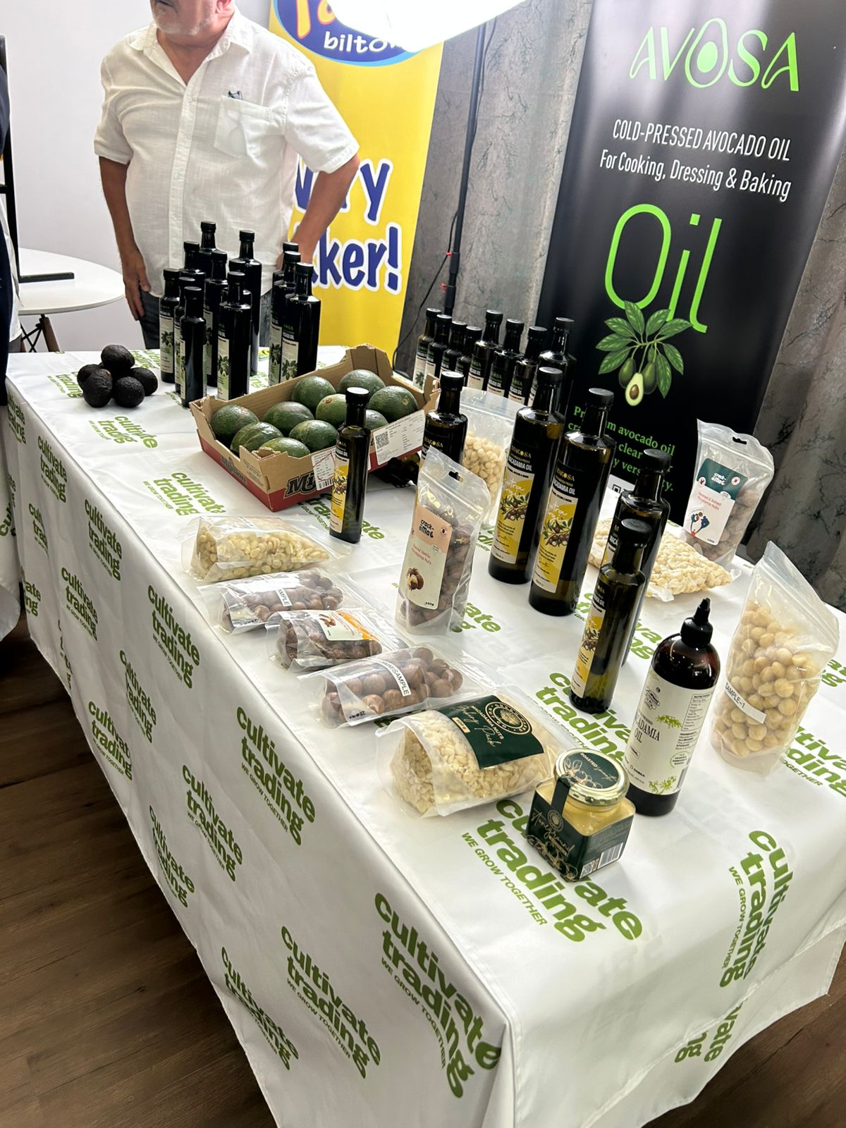 AVOSA cold-pressed avocado oil display with packaged produce